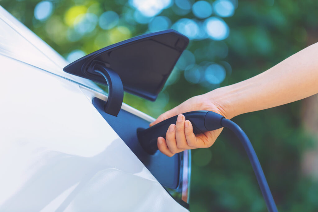 Charging an electric vehicle with solar power and renewable energy.