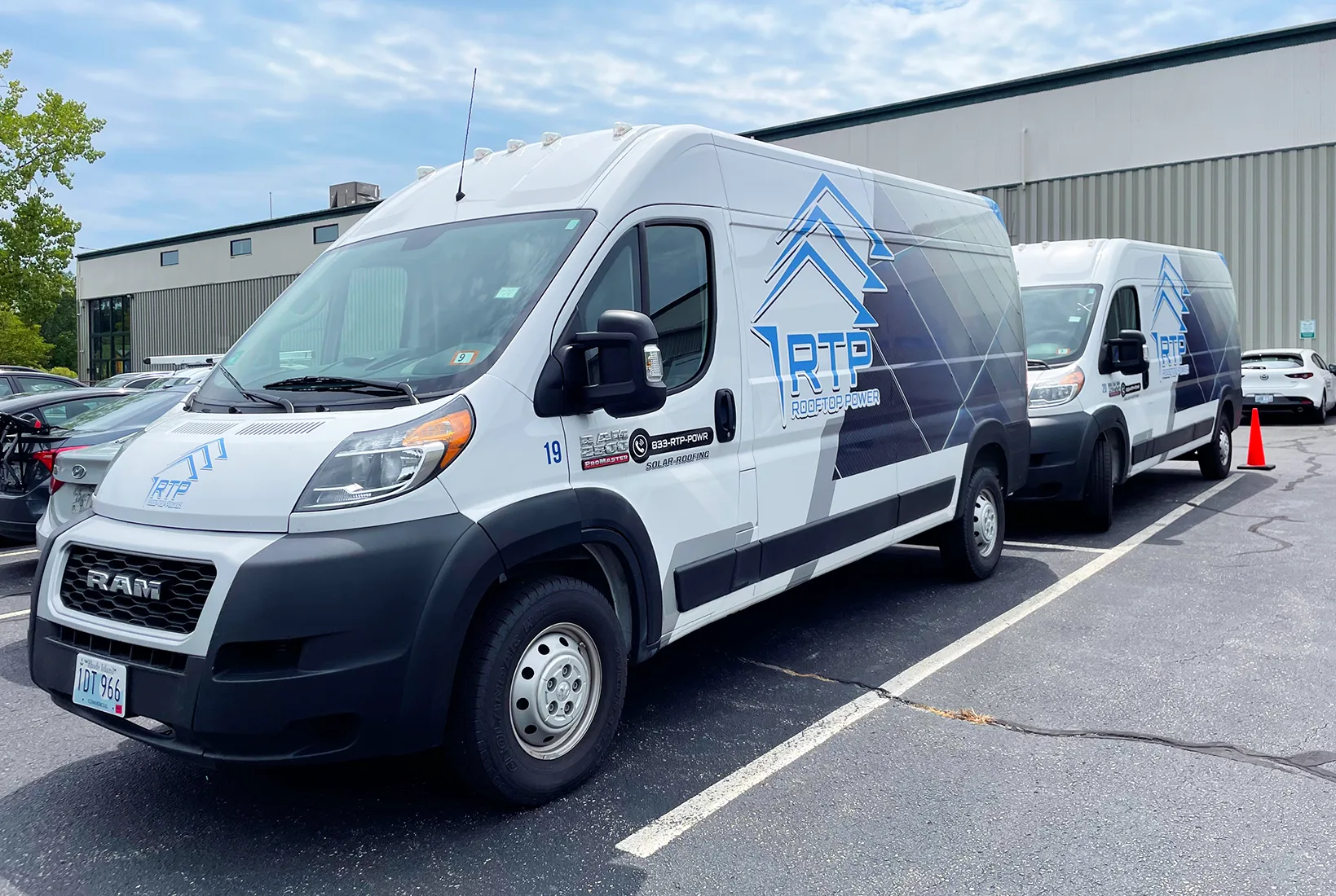 Rooftop Power Co. service vans and in-house installation crews for solar panel and roofing projects.