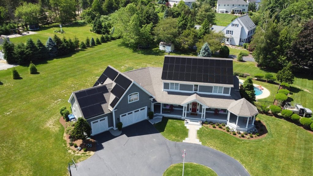 Rooftop solar panel installation on a Warwick, Rhode Island home.