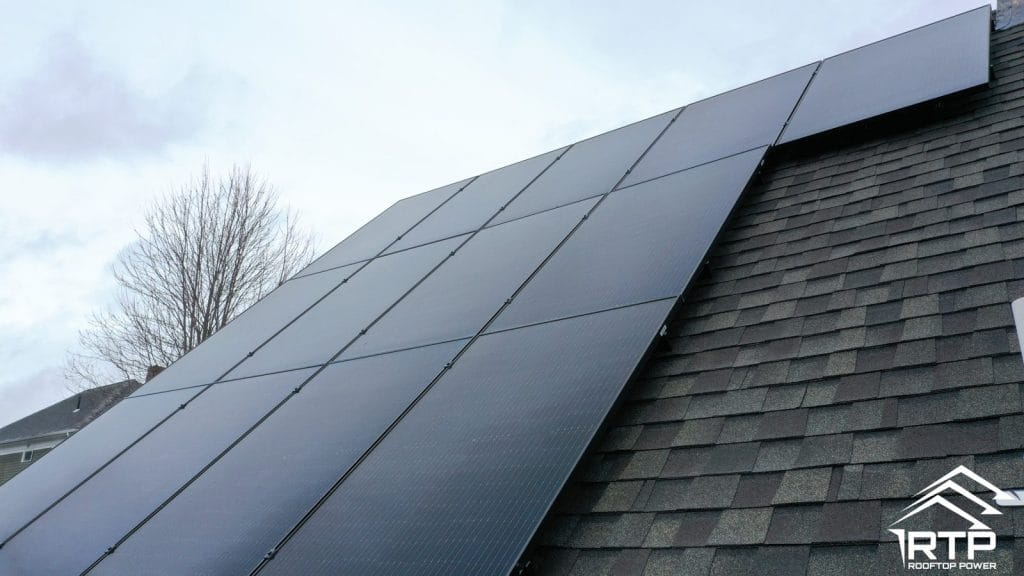 Rooftop Power solar panel installation on a New England home roof.