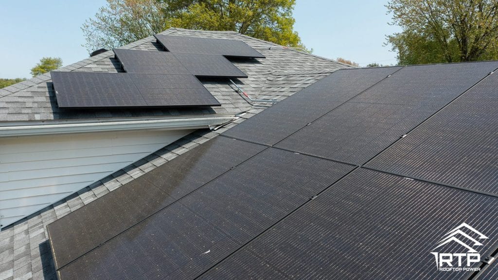 Rooftop Power solar panel installation on a New England home roof.