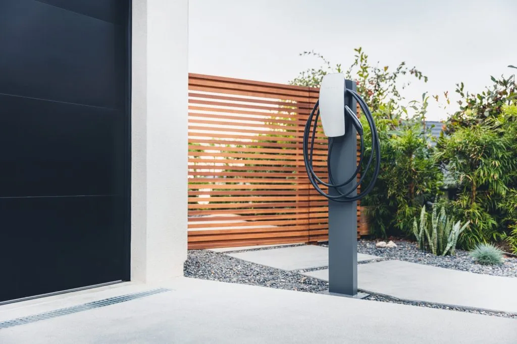 Tesla Wall Connector installed at a home, enabling Level 2 EV charging with solar power.