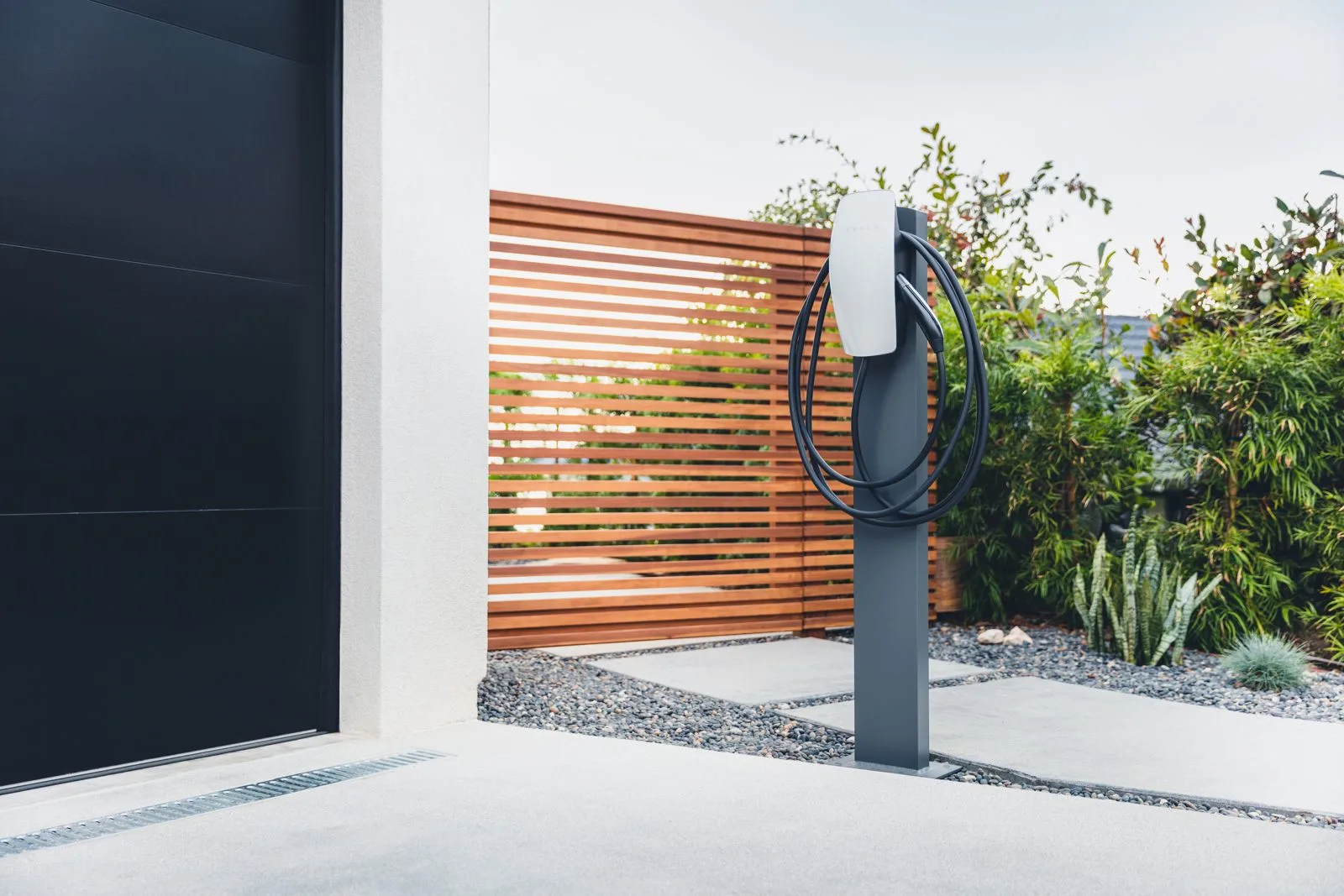 Tesla Wall Connector installed at a home, enabling Level 2 EV charging with solar power.