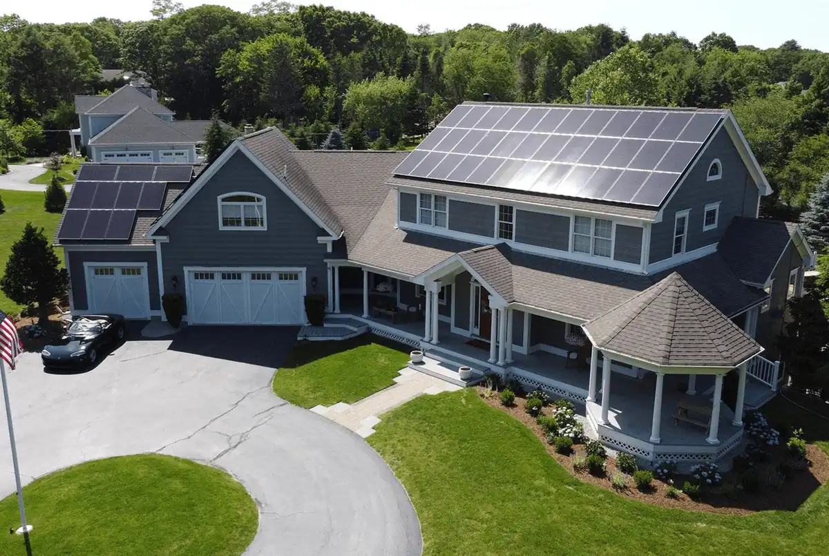 Home with rooftop solar panels and EV charger add-ons